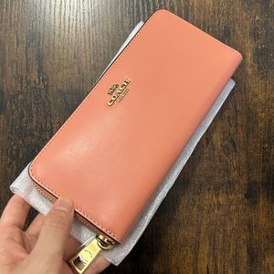 Coach slim accordion zip wallet